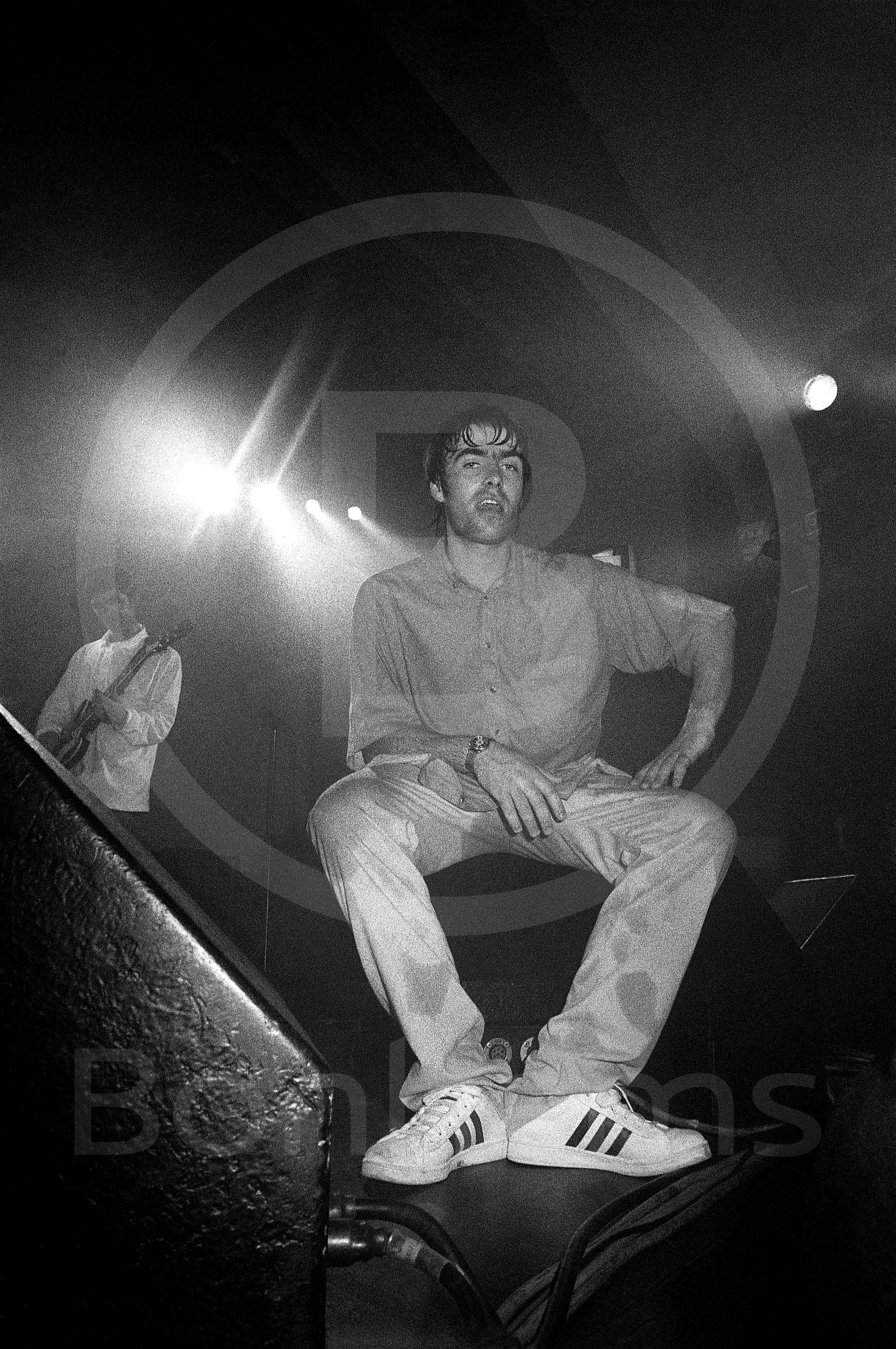 Artwork by Tom Sheehan, Oasis performing at Bath Pavilion, Made of Photographs - Black and white negatives (115); Colour transparencies  (50)