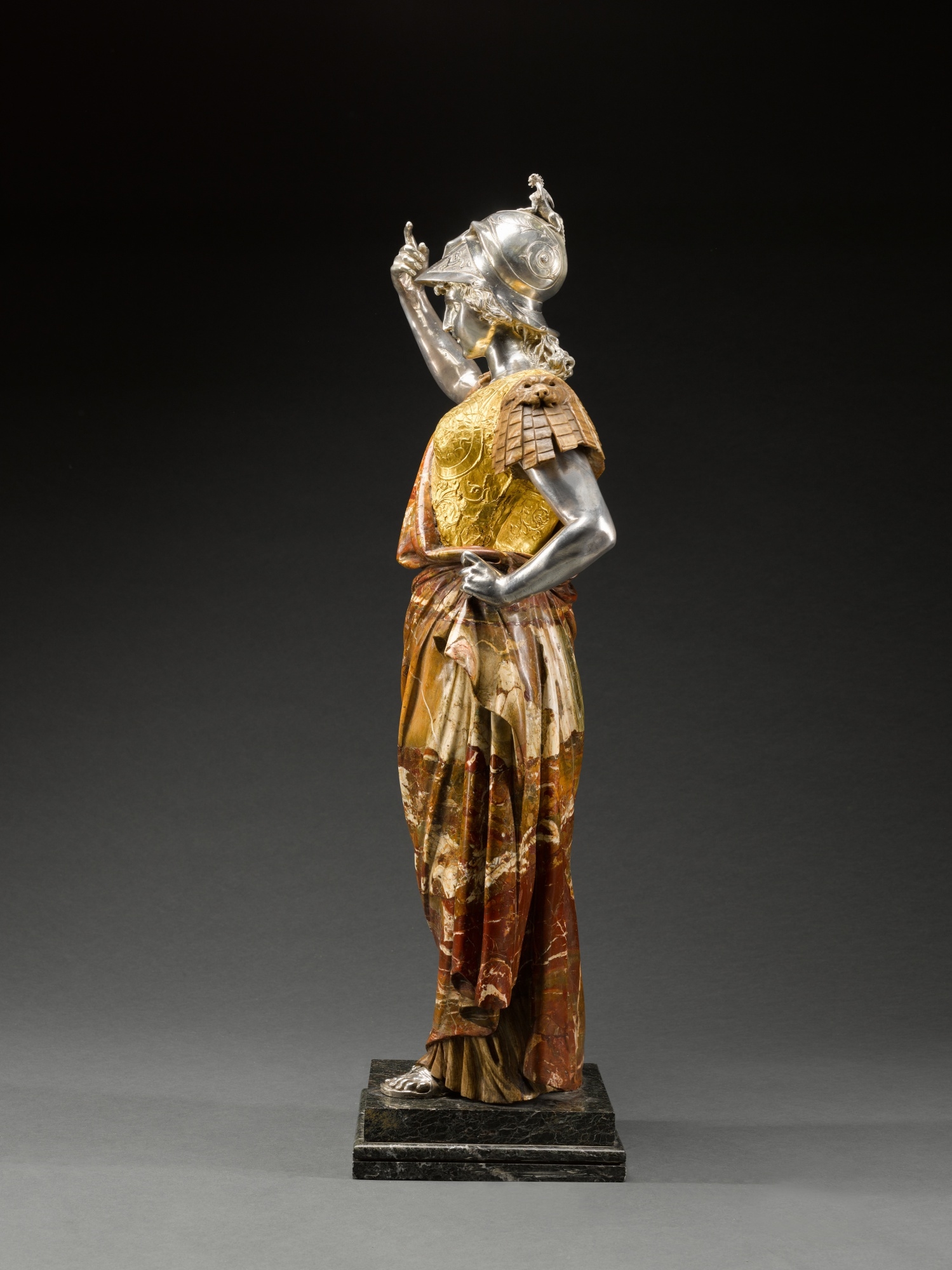 Artwork by Roman School, 19th Century, Minerva, Made of Sicilian jasper, travertine, cast silver, and hammered gold, on an integral serpentinite stone base