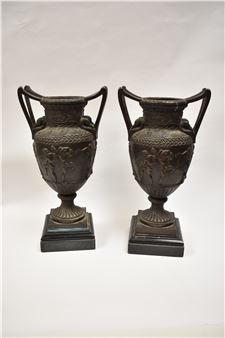 A pair ofth Century  the vases are of classical design with double handles leading to swans' heads, the neck has an Art Nouveau influenced sprawling vine over a bulbous body decorated with classical dancing figures - Auguste-maximilien Delafontaine