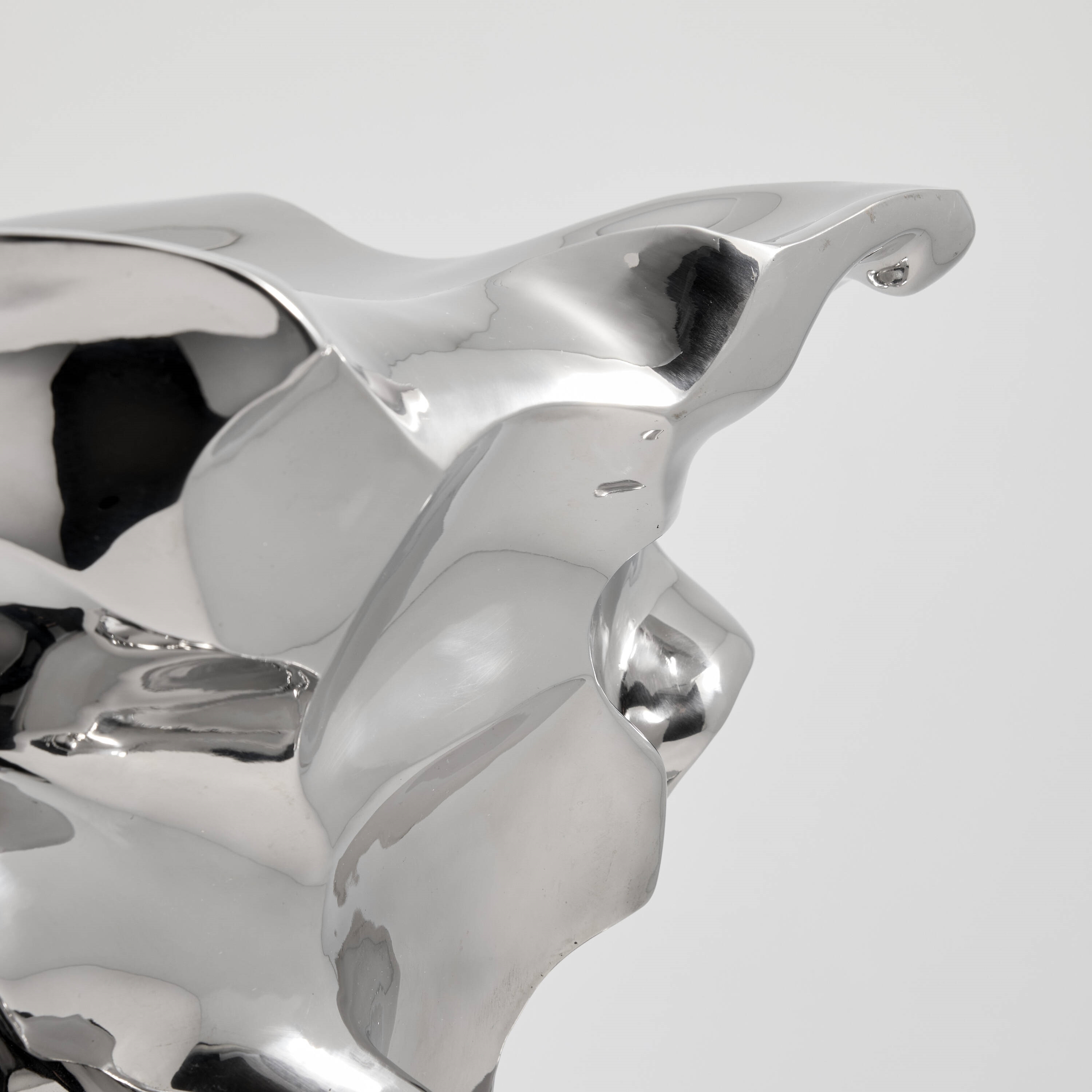 Artwork by Shi Jianmin, Accordion stool, Made of stainless steel