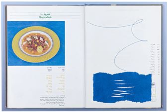 A book with a drawing of a plate of food on it.