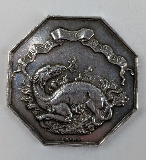 Artwork by Alphonse Desaide - Roquelay, A French octagonal solid silver token Obverse decorated with a dragon in flames and inscribed "Nutrisco et Extinguo", Made of solid silver