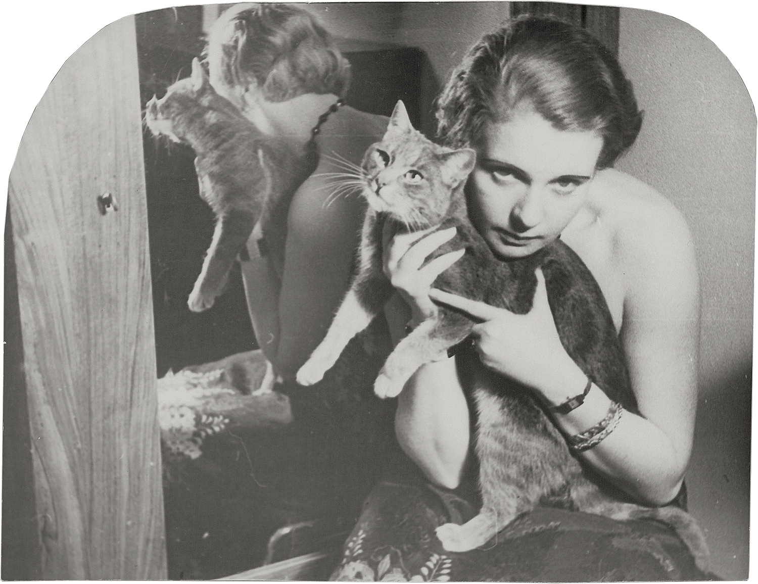 Artwork by Franz Roh, Untitled (Woman with cat), Made of Vintage gelatin silver print with rounded corners