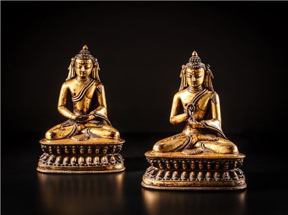 Two gilt-copper alloy figures of Amitabha and Vairocana by Tibetan School, 14th Century