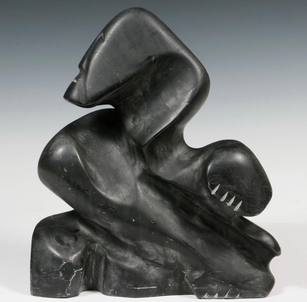 Artwork by Alex Alikashuak, Transformation, Made of carved black soapstone