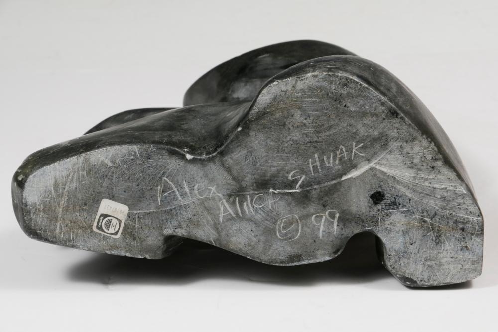 Artwork by Alex Alikashuak, Transformation, Made of carved black soapstone