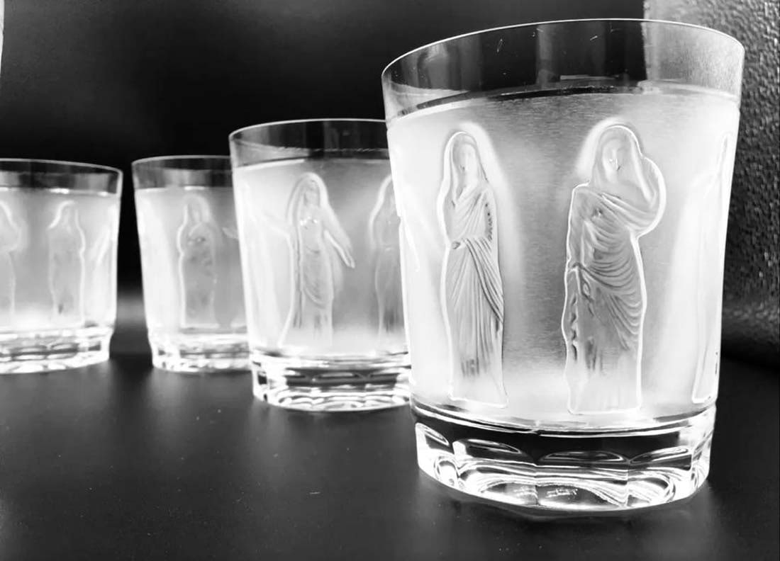 Artwork by René Lalique, A LALIQUE Femmes Crystal Set of Decanter & Tumblers, Signed, Made of frosted crystal