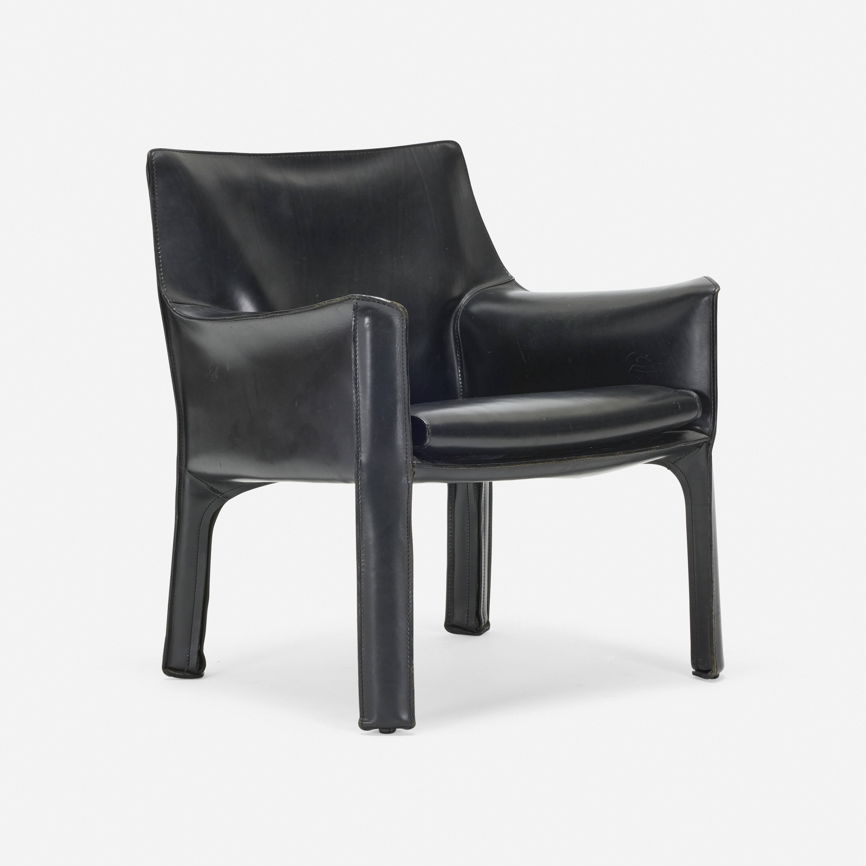 Artwork by Mario Bellini, Cab lounge chair, model 413, Made of leather over enameled steel, plastic