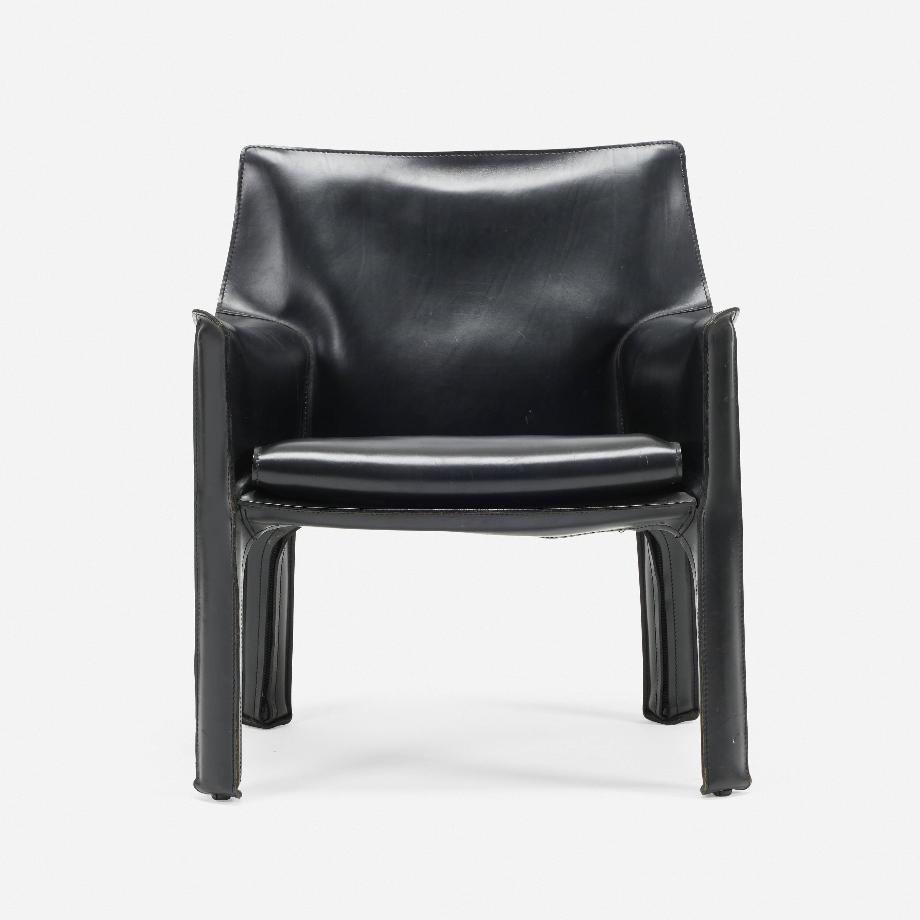 Artwork by Mario Bellini, Cab lounge chair, model 413, Made of leather over enameled steel, plastic