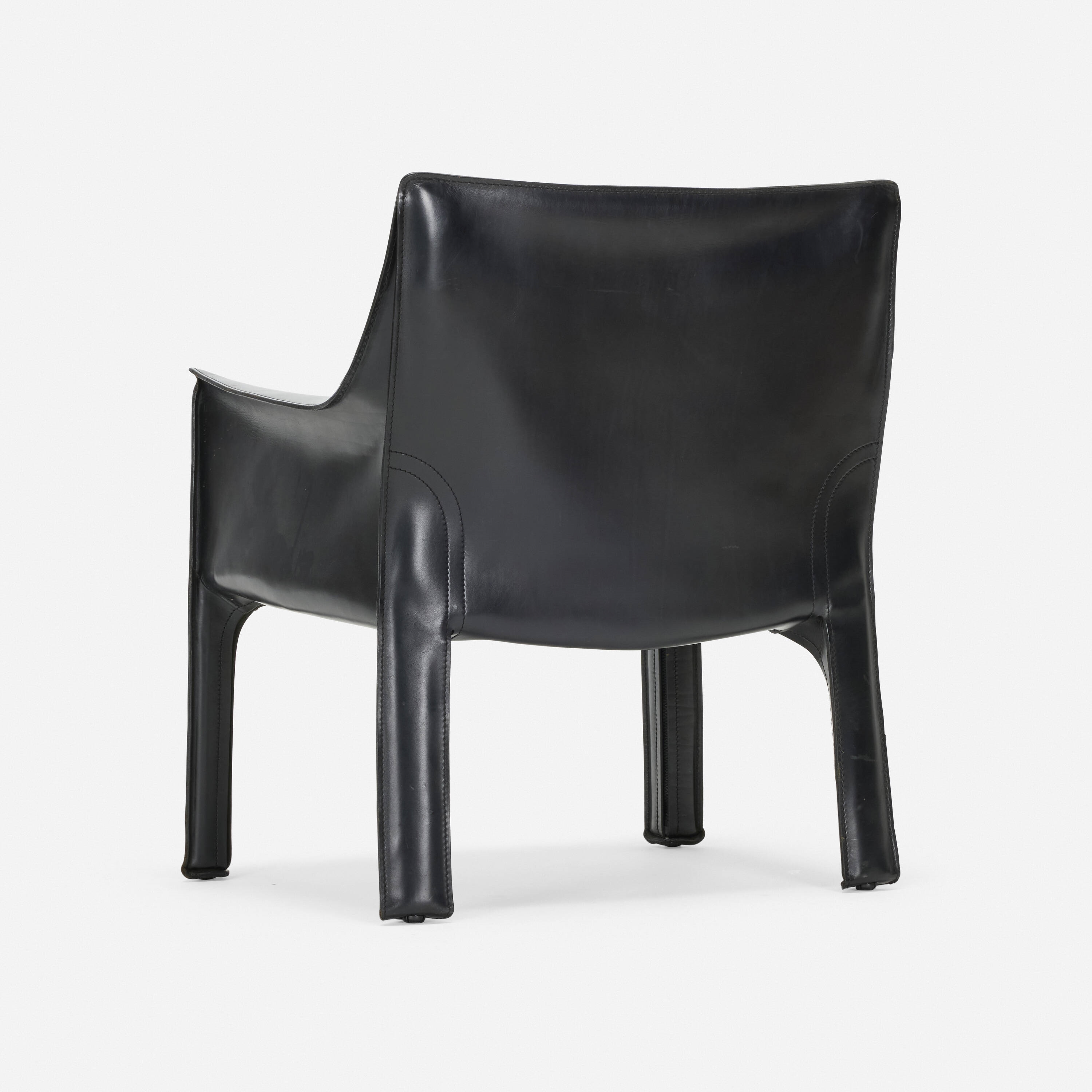 Artwork by Mario Bellini, Cab lounge chair, model 413, Made of leather over enameled steel, plastic