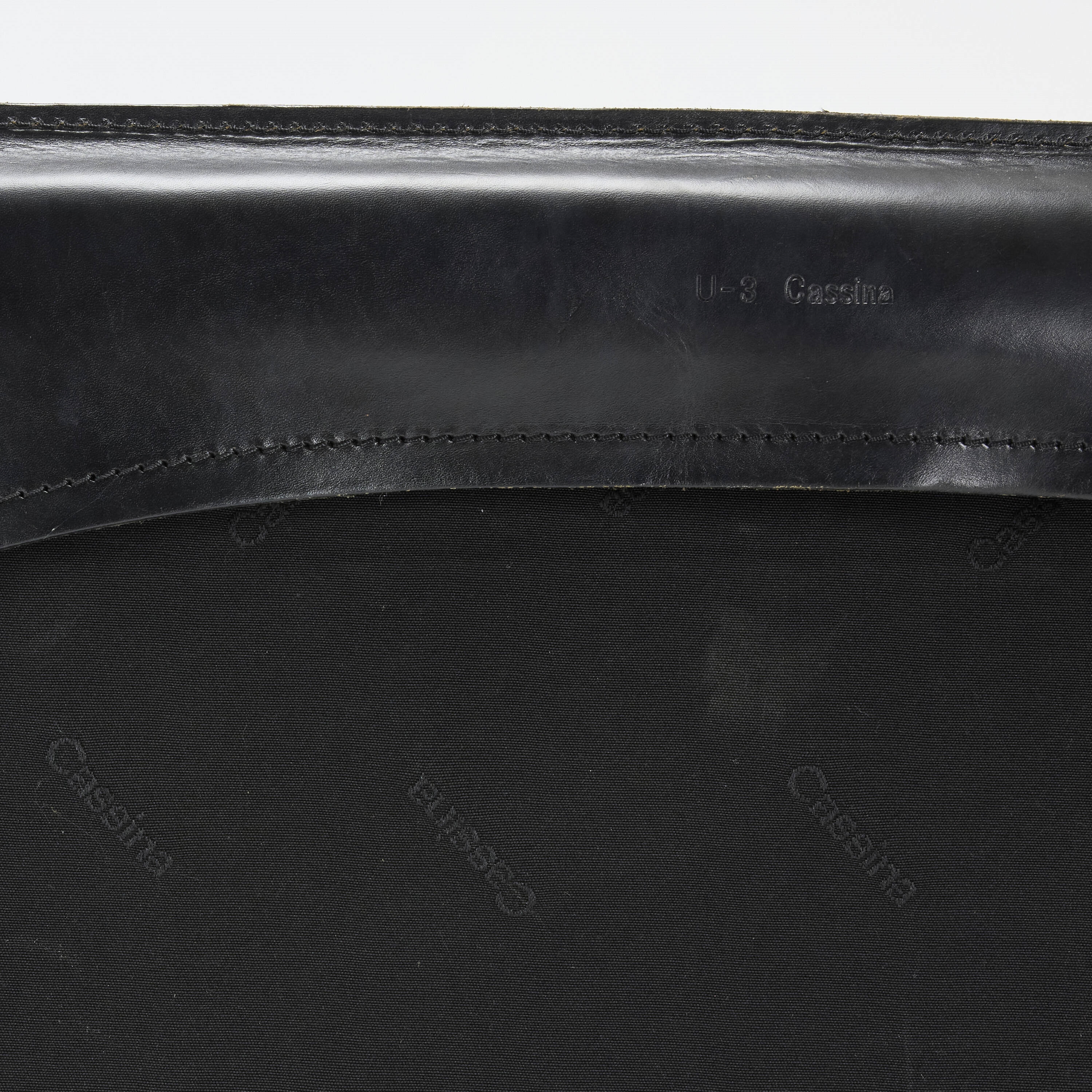 Artwork by Mario Bellini, Cab lounge chair, model 413, Made of leather over enameled steel, plastic