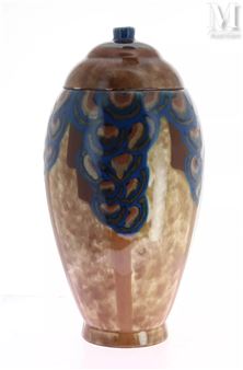 A ceramic vessel with a lid featuring an abstract blue and brown pattern.
