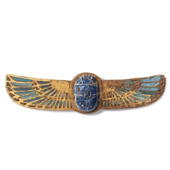 An Egyptian gilt wood and blue glass winged scarab - Egyptian School