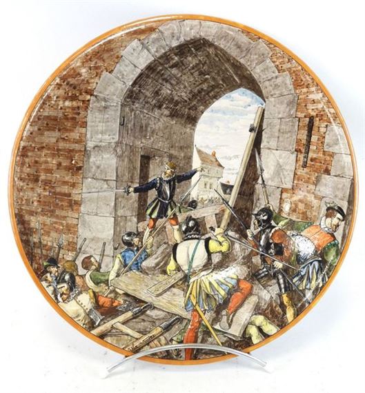 Polychrome earthenware heel dish decorated with a historiated scene of an assault in town, in the Renaissance style
