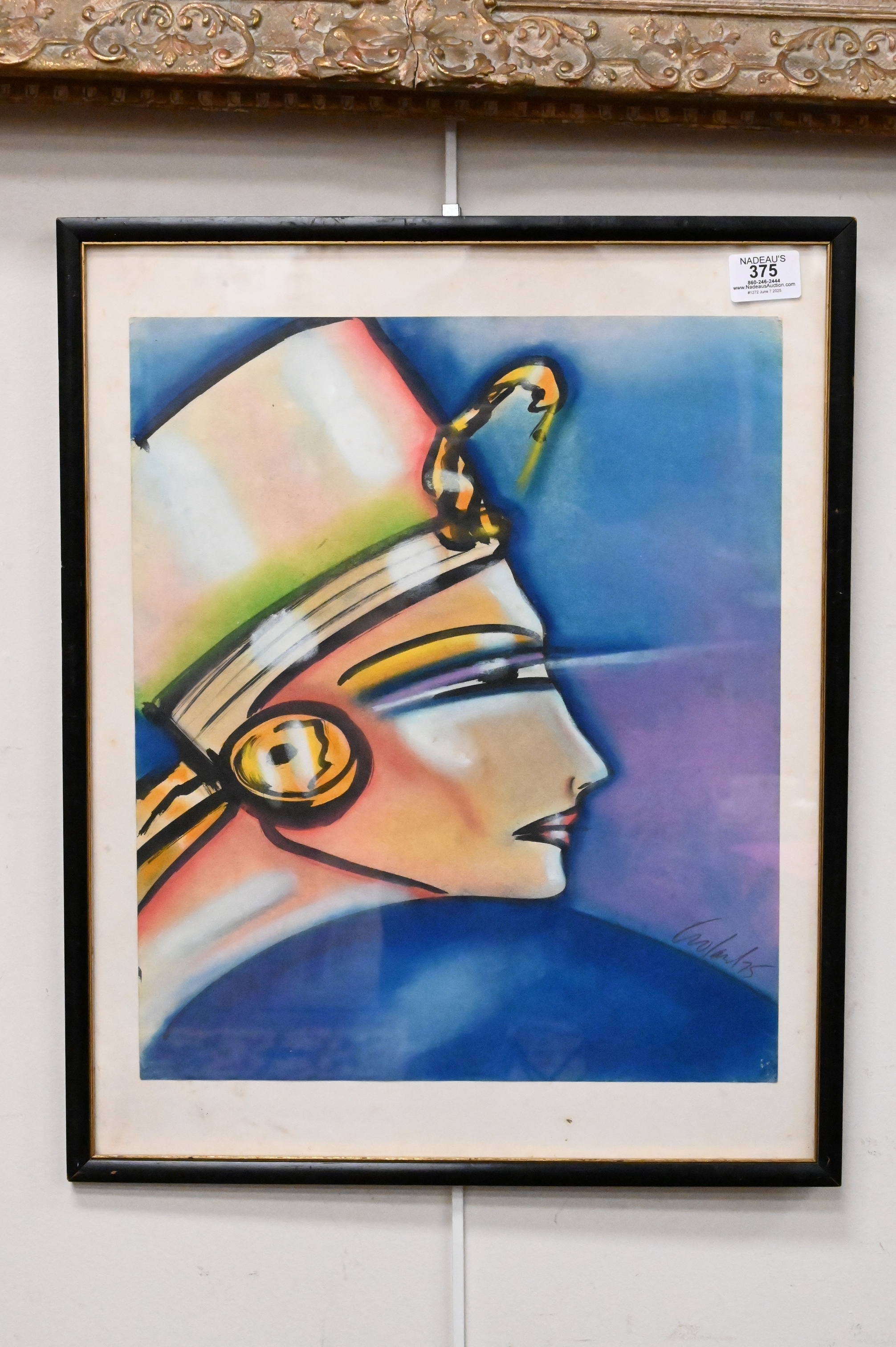 A stylized profile portrait of a figure wearing an elaborate headdress against a blue background.
