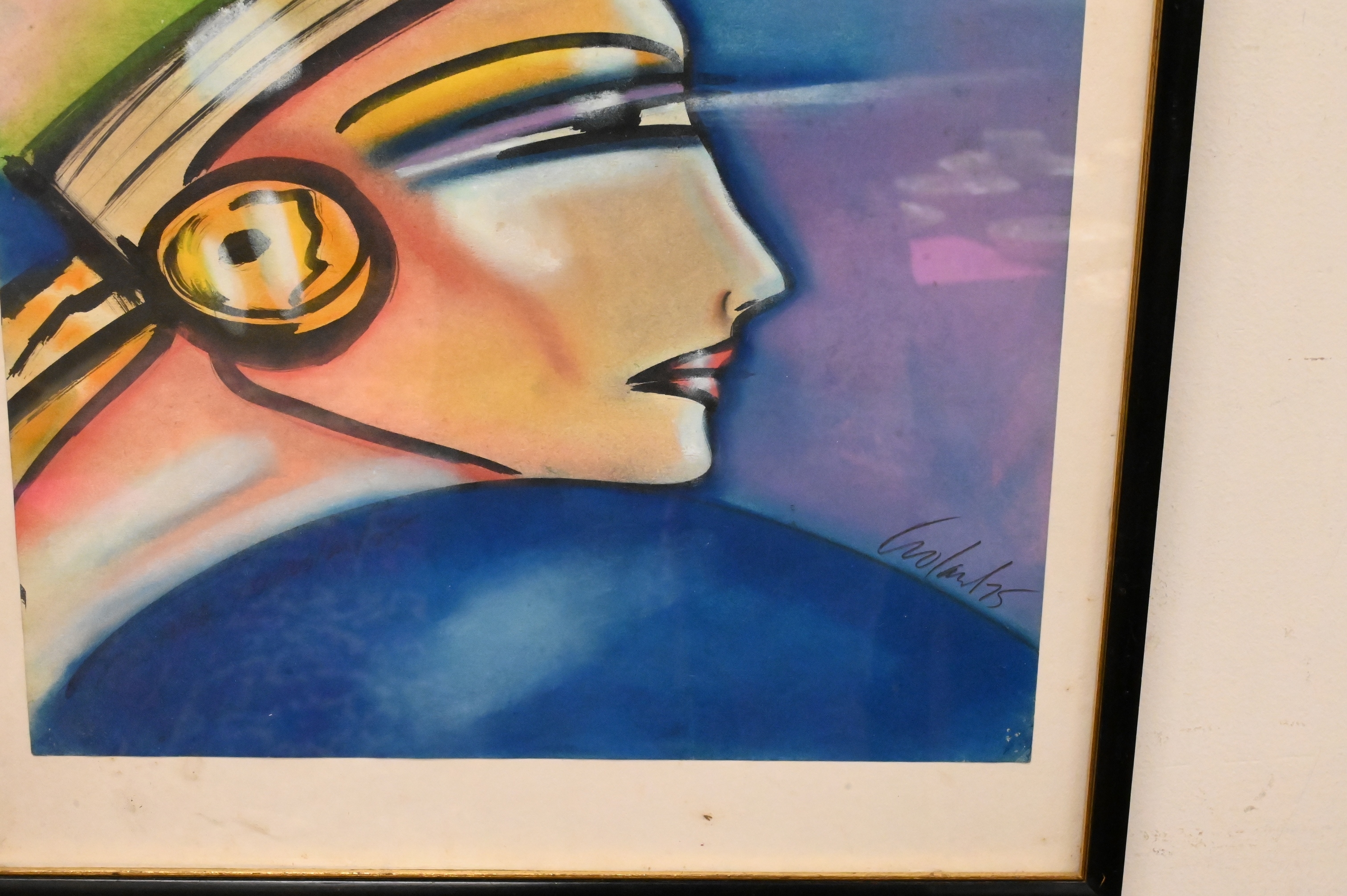 A stylized profile portrait of a figure wearing an elaborate headdress against a blue background.