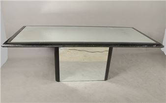 RECTANGULAR dining-room table, circa 1980, in black melamine-coated wood, resting on a high pedestal with rounded uprights, top and base adorned with mirrors - Claude Saint-Pierre