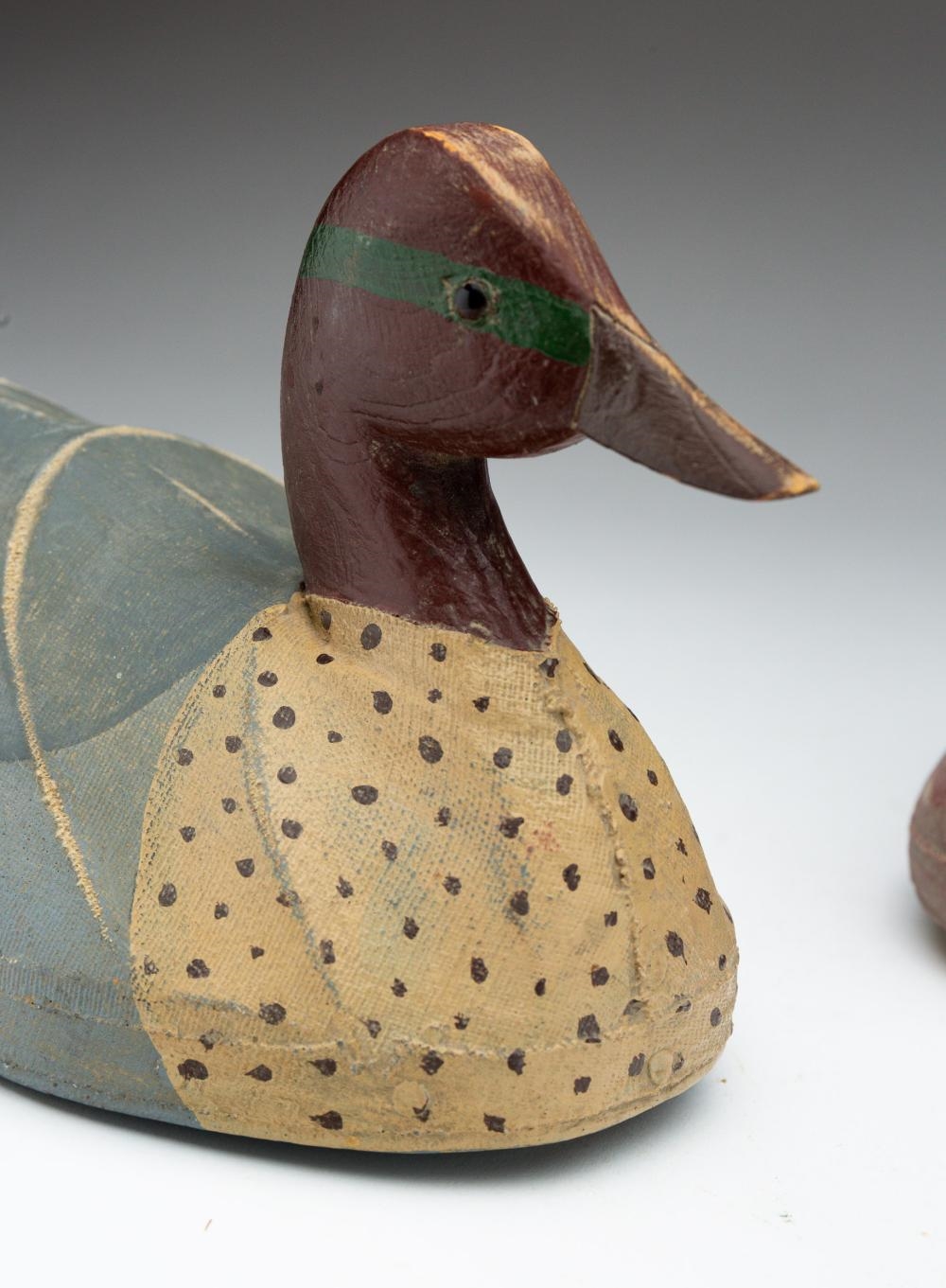 Artwork by William Mosley, THREE WILLIAM MOSLEY (NORTH CAROLINA, 1925-2015) CARVED WOOD AND CANVAS-OVER-WIRE DUCK DECOYS, Made of CARVED WOOD AND CANVAS