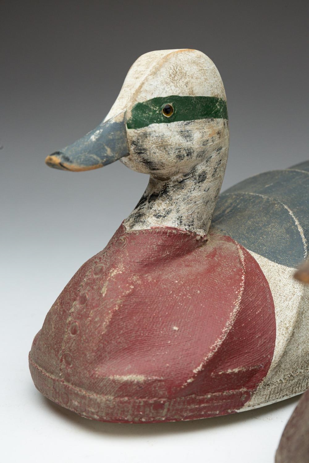 Artwork by William Mosley, THREE WILLIAM MOSLEY (NORTH CAROLINA, 1925-2015) CARVED WOOD AND CANVAS-OVER-WIRE DUCK DECOYS, Made of CARVED WOOD AND CANVAS