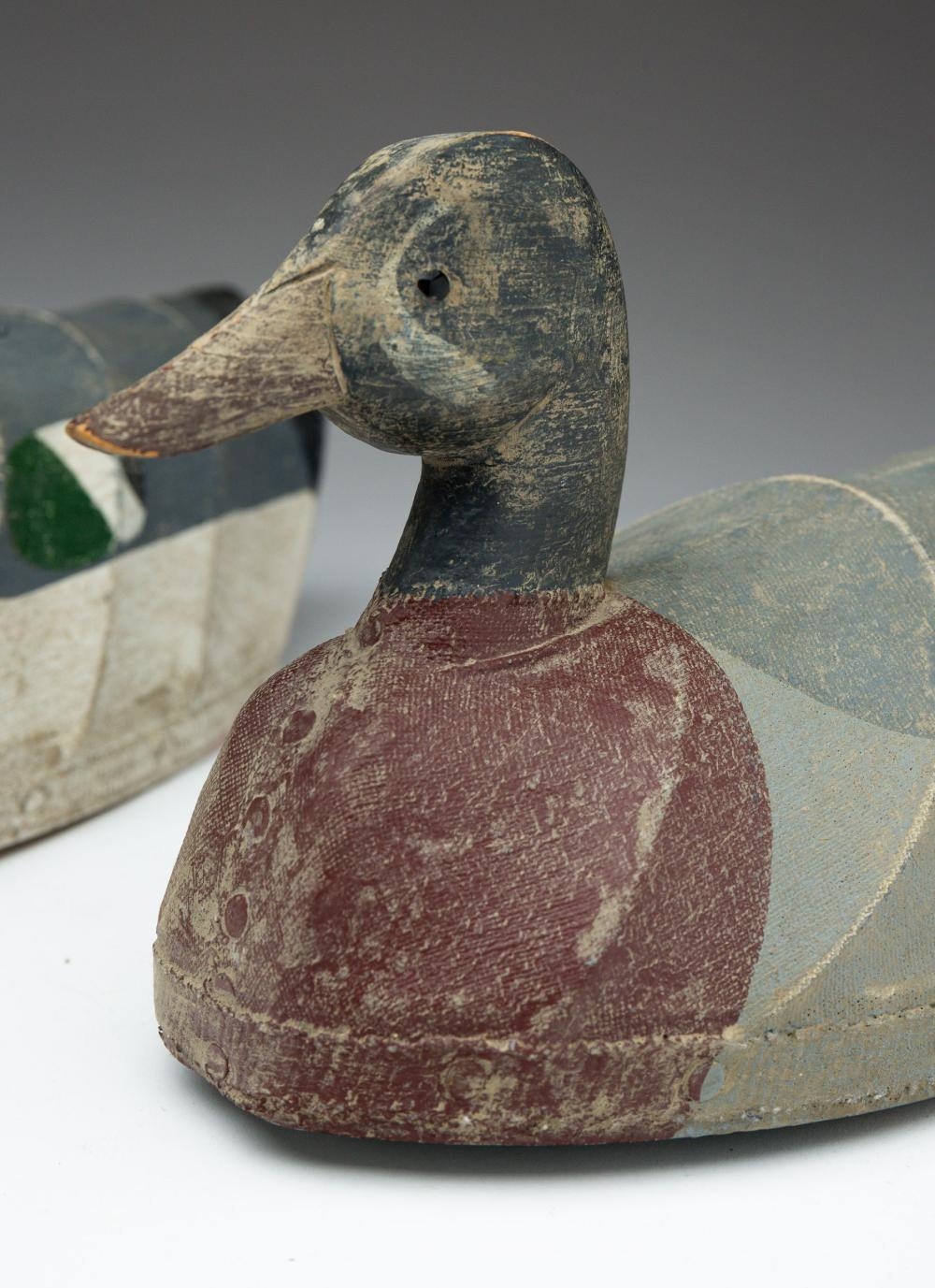 Artwork by William Mosley, THREE WILLIAM MOSLEY (NORTH CAROLINA, 1925-2015) CARVED WOOD AND CANVAS-OVER-WIRE DUCK DECOYS, Made of CARVED WOOD AND CANVAS