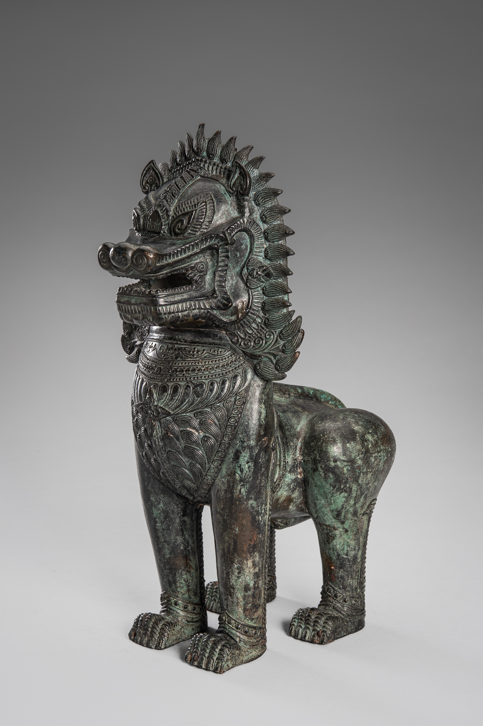 Thai School, 19th Century | A PAIR OF BRONZE GUARDIAN LIONS, KHMER ...