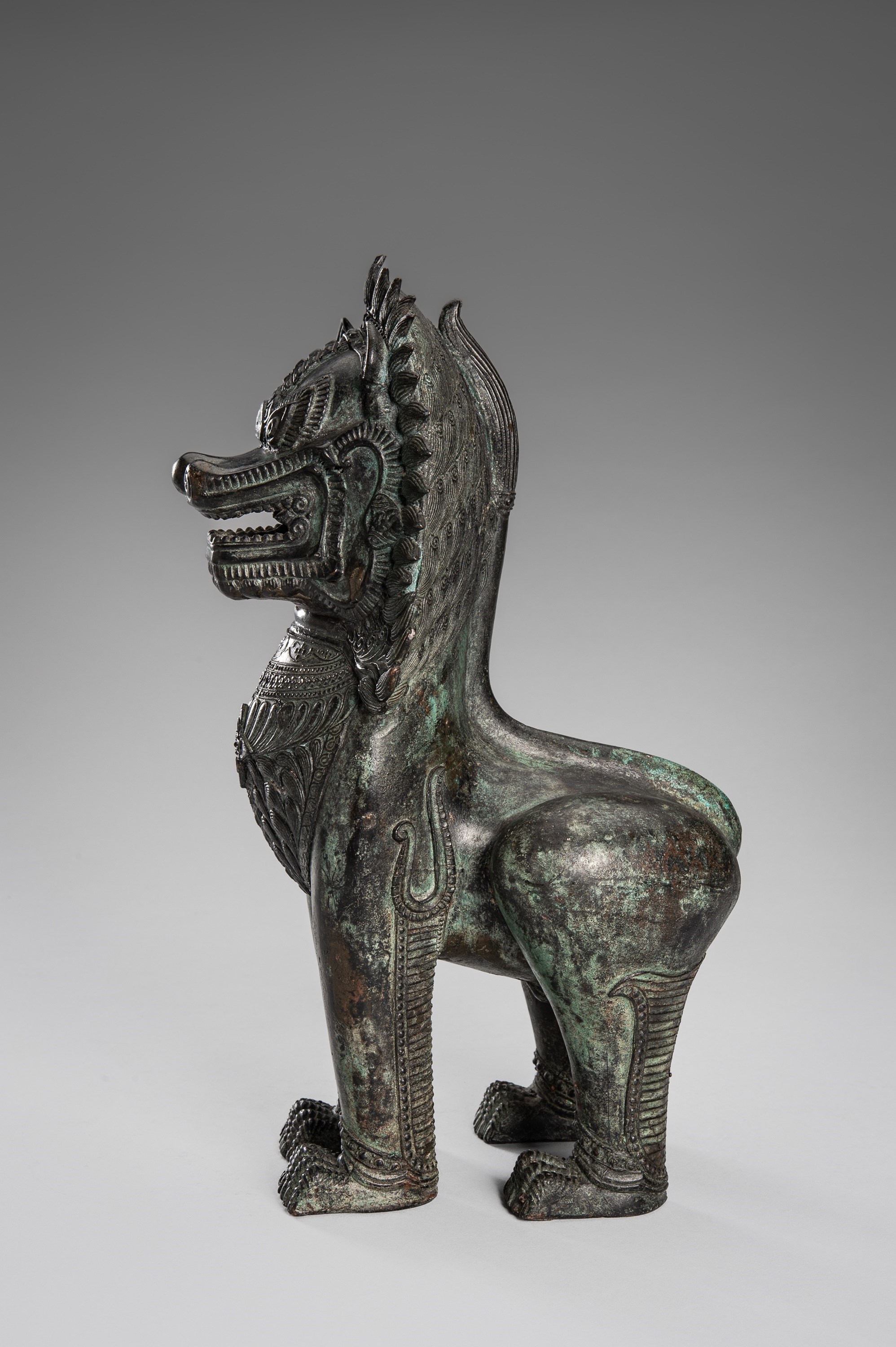 Thai School, 19th Century | A PAIR OF BRONZE GUARDIAN LIONS, KHMER ...