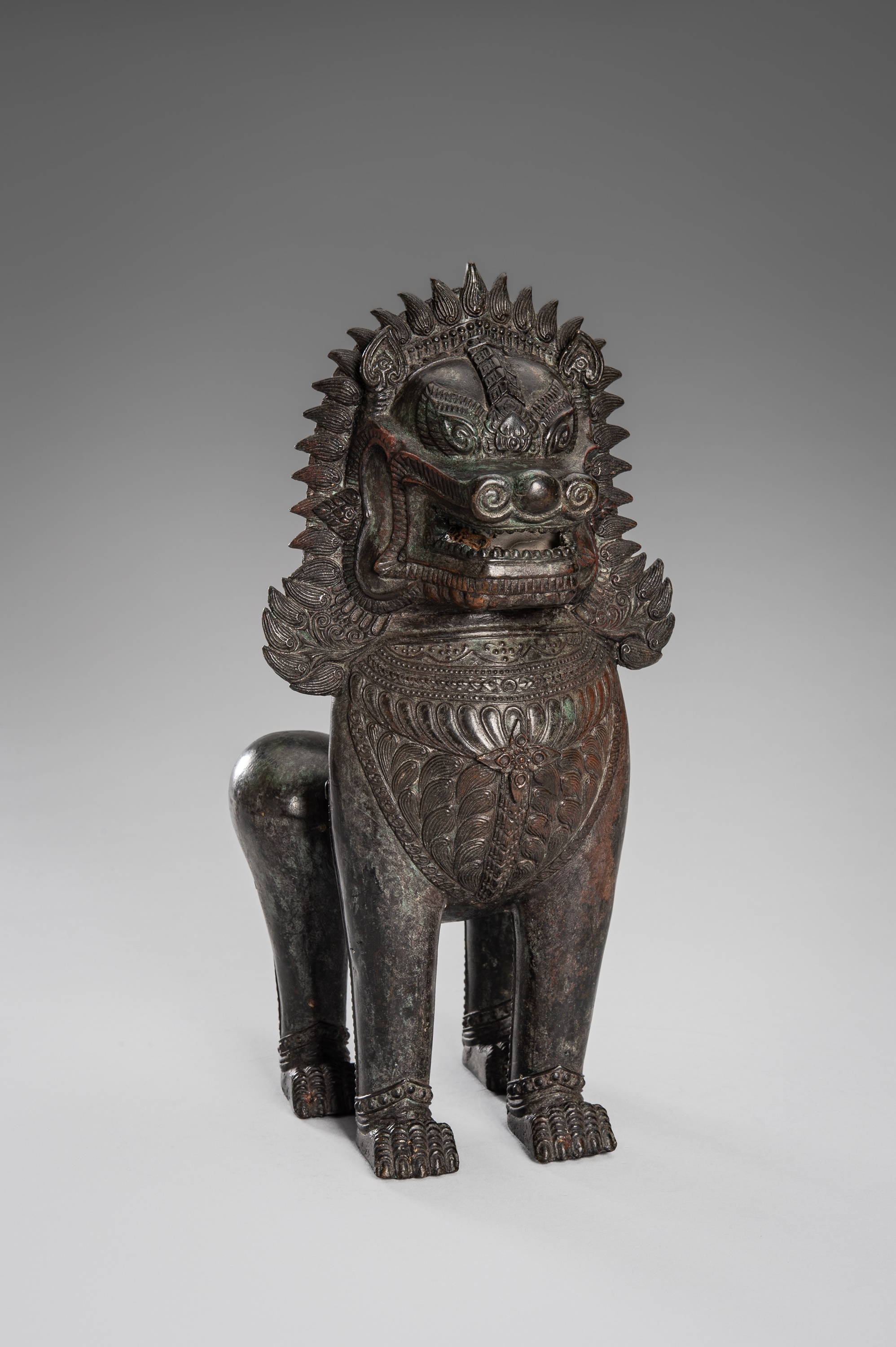Thai School, 19th Century | A PAIR OF BRONZE GUARDIAN LIONS, KHMER ...
