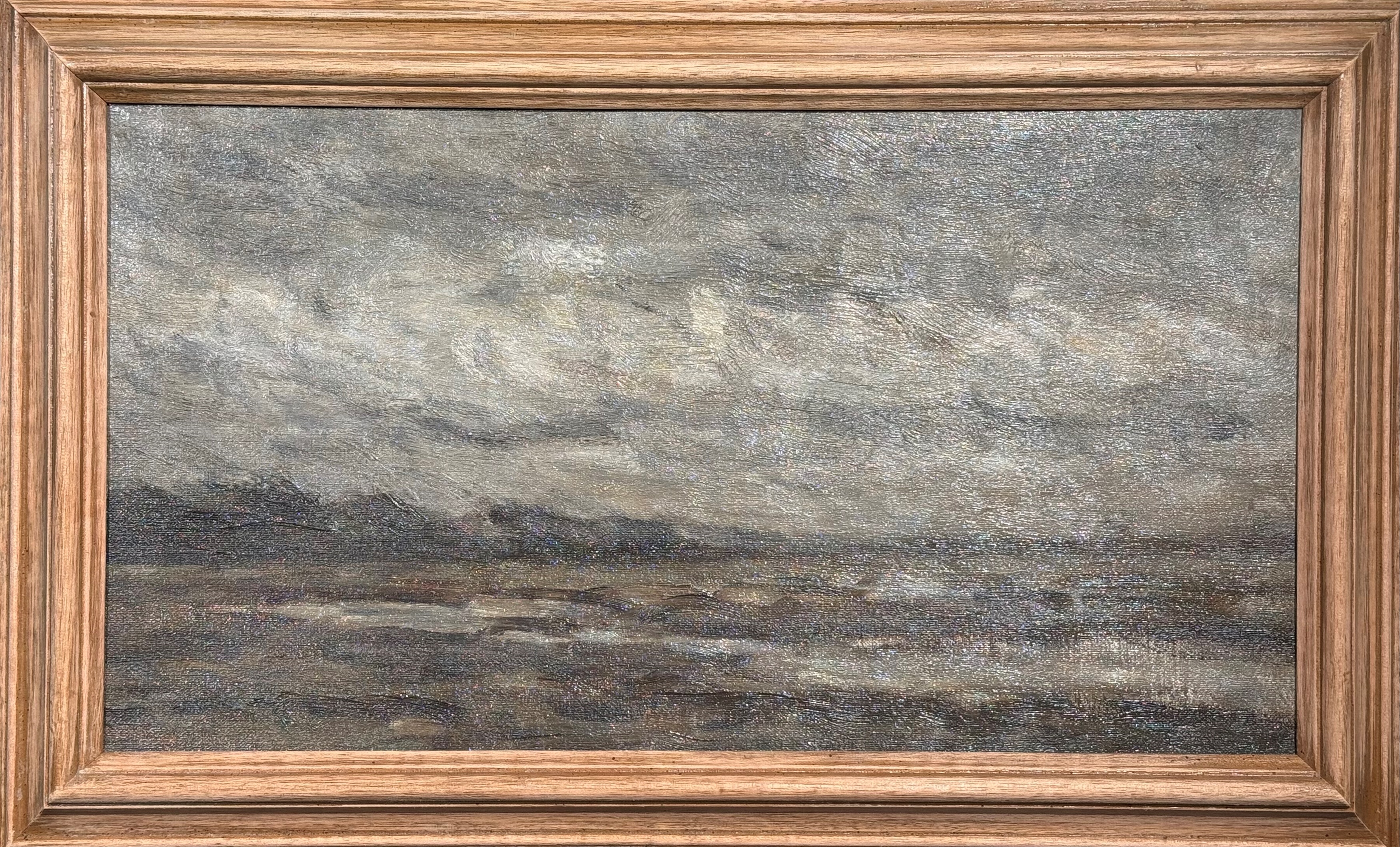 A muted landscape painting of a distant shore under an overcast sky.