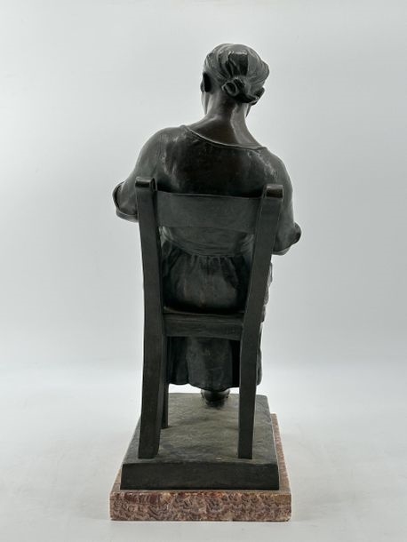Artwork by Oscar De Beul, Young mother with child resting on a chair, Made of Bronze