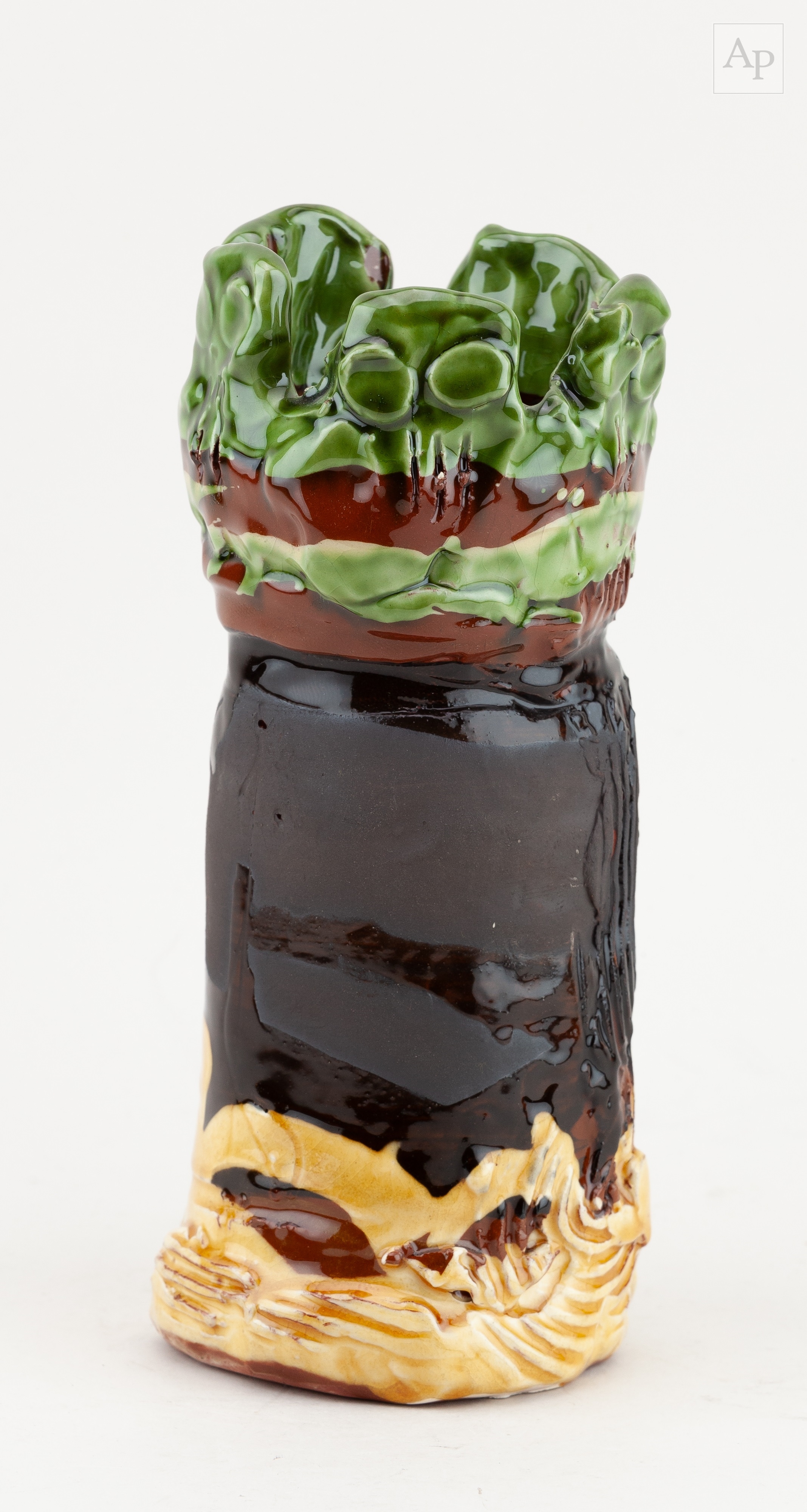 Dylan Bowen | a cylindrical slip decorated earthenware vase with ...