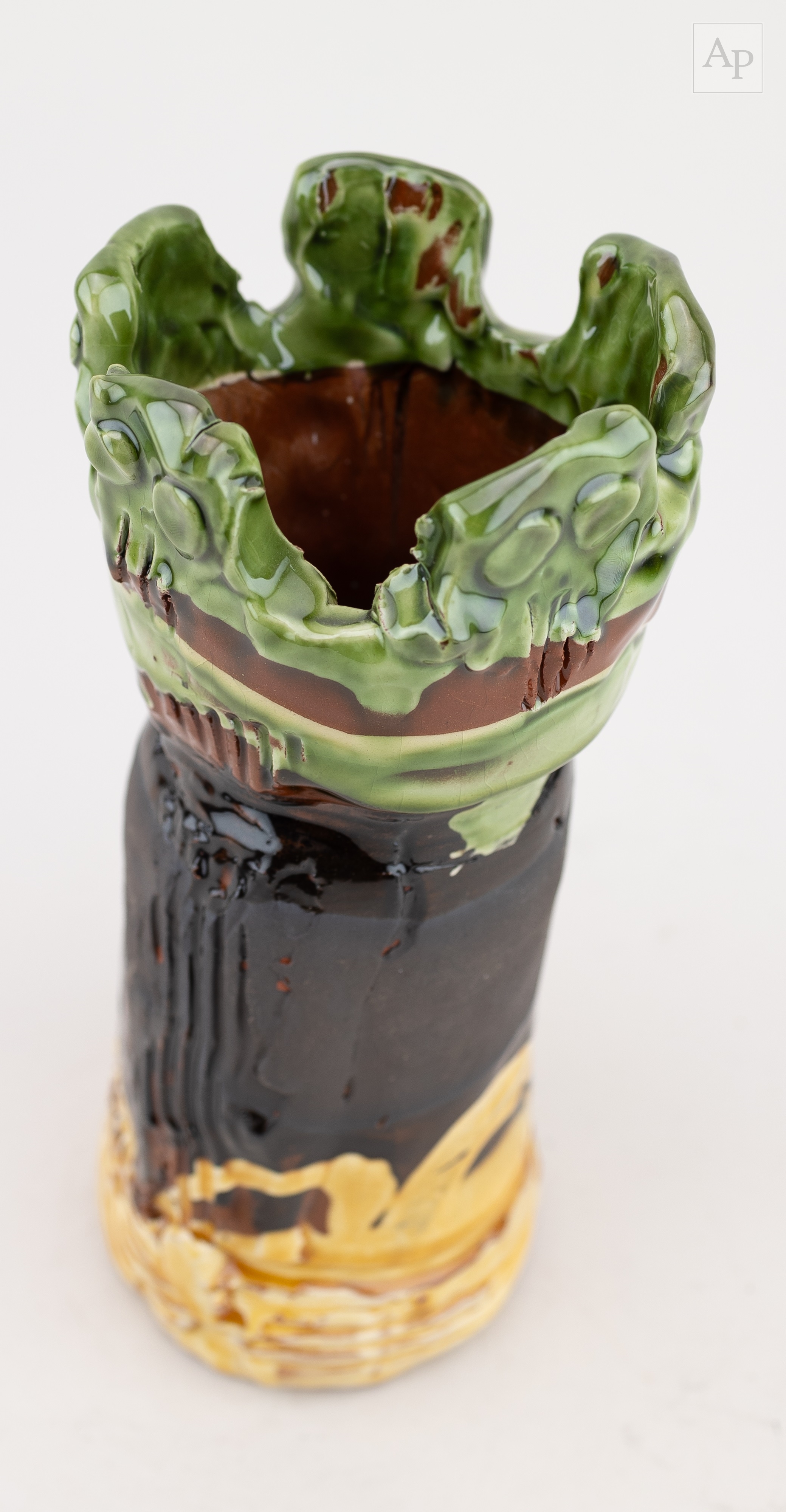 Dylan Bowen | a cylindrical slip decorated earthenware vase with ...