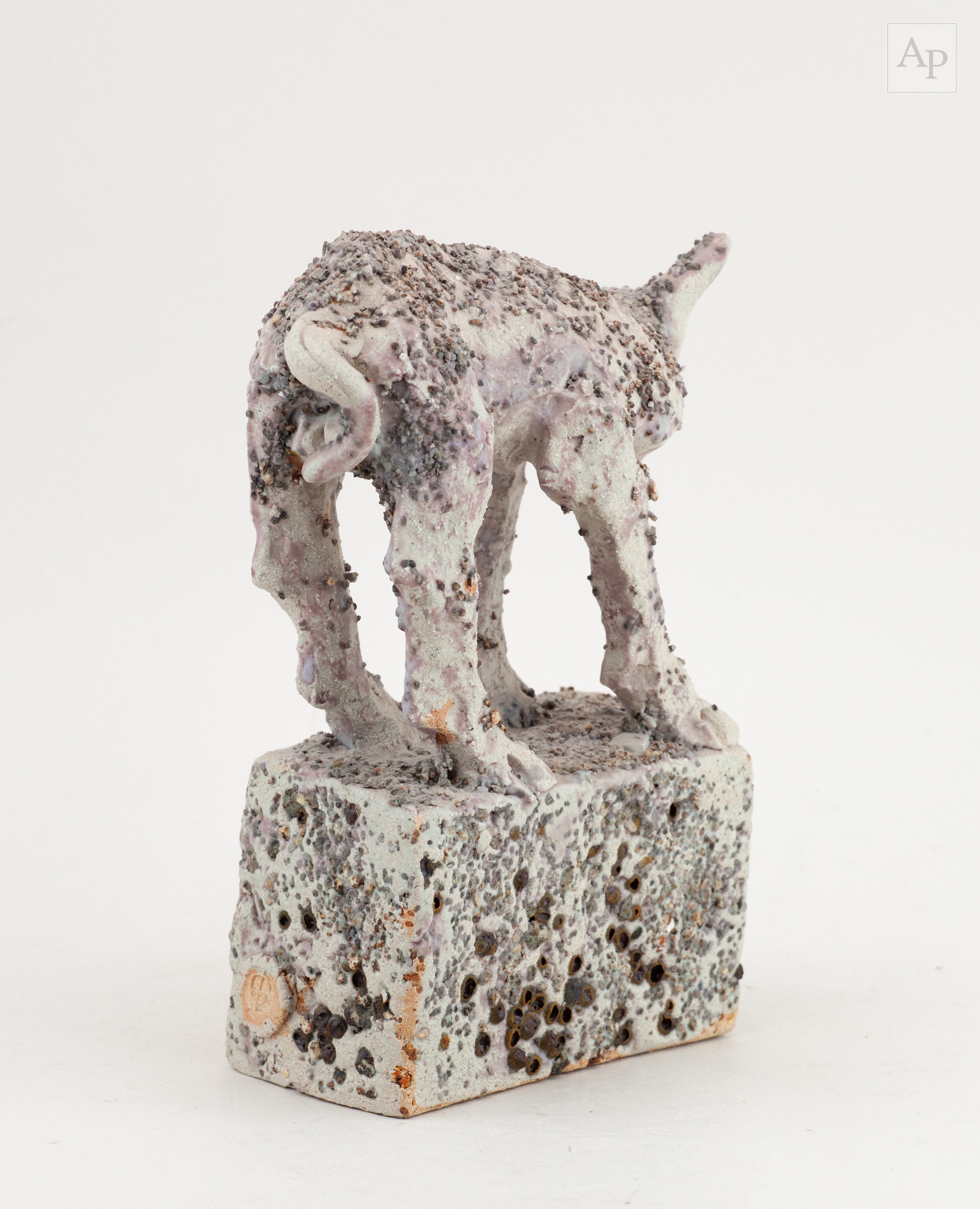 Ian Gregory | a grogged stoneware sculpture of a dog on a rectangular ...