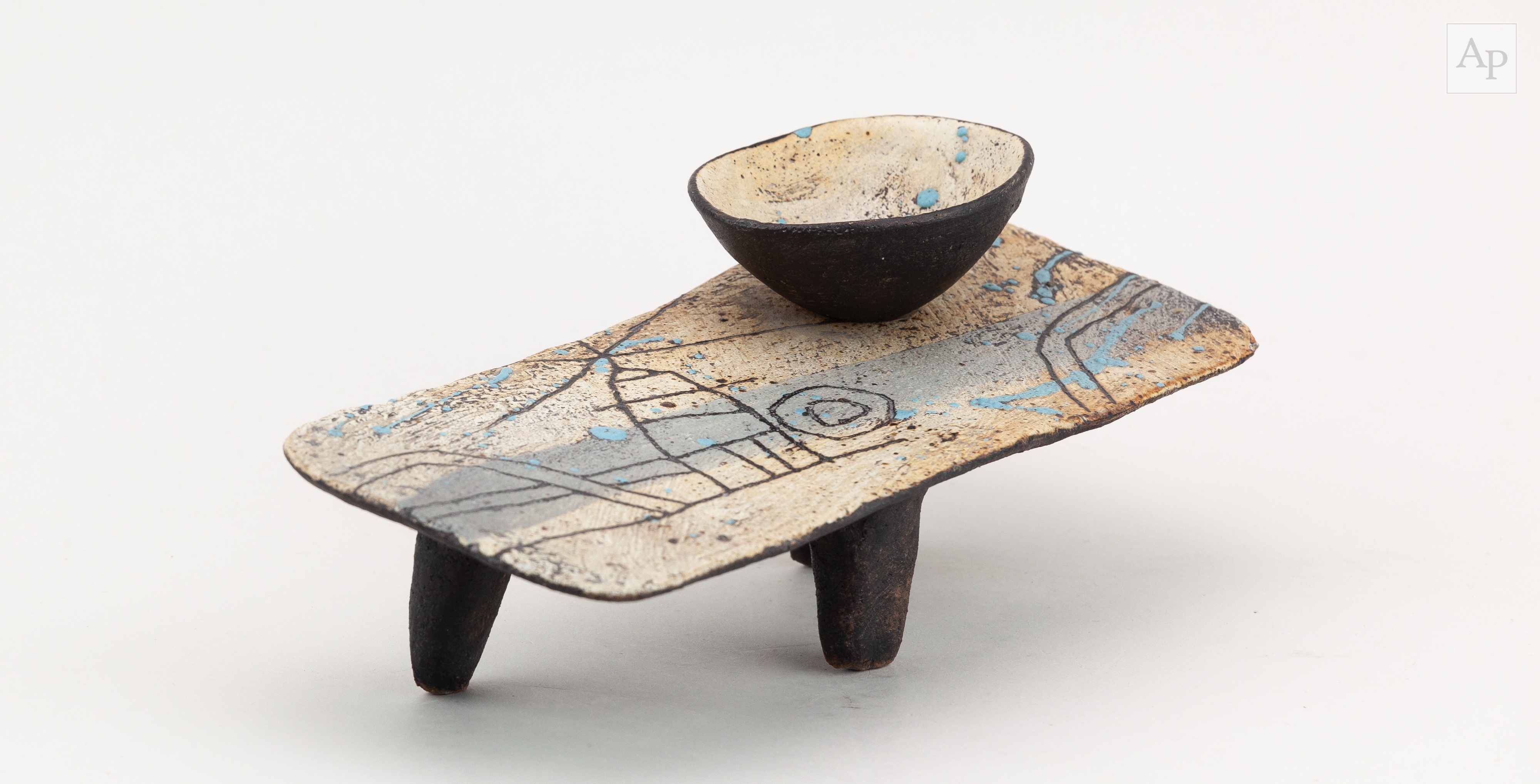 John Maltby | a sloping stoneware table form on tripod feet decorated ...