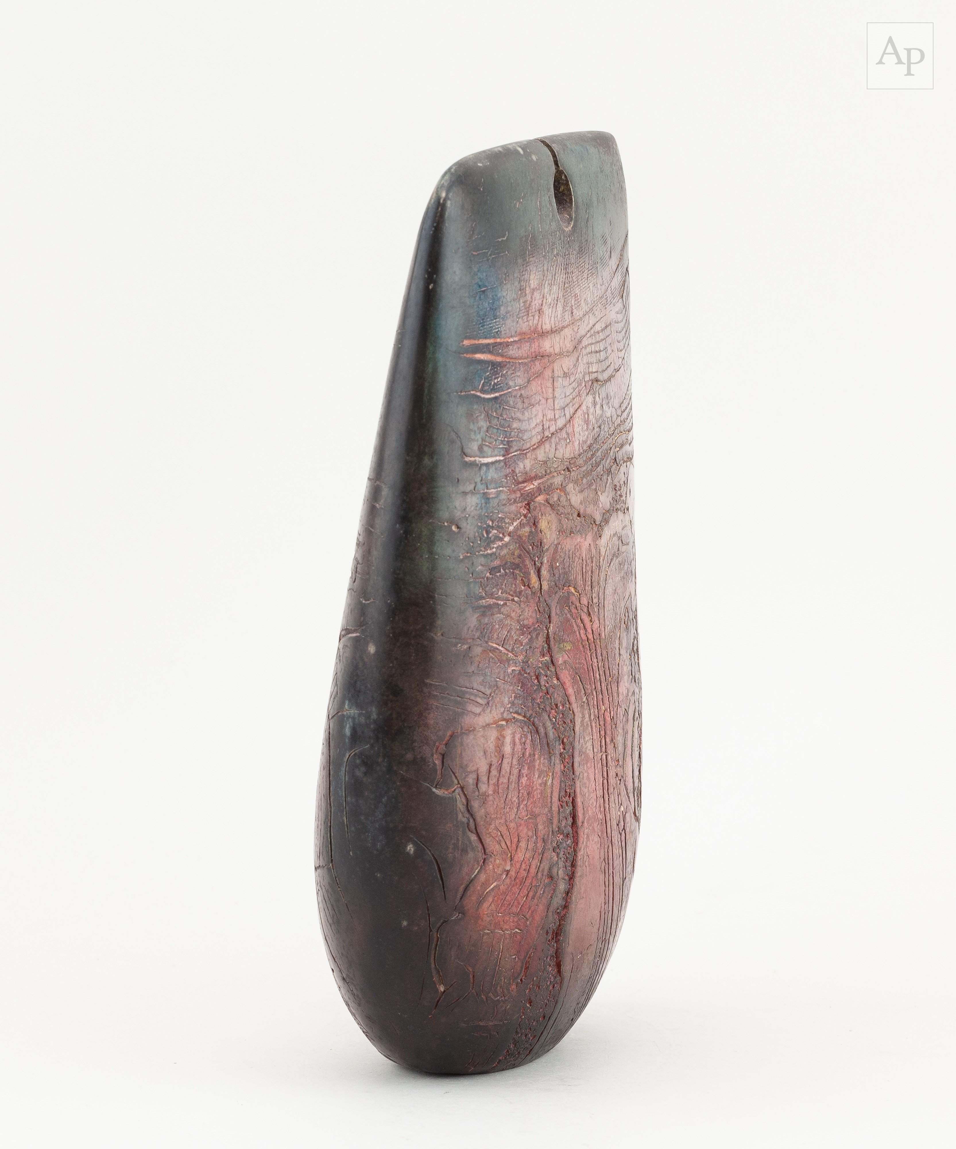 Artwork by Peter Hayes, a raku bow with fractured red and black smoky surface and keyhole, Made of raku