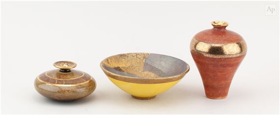 a small white porcelain bowl with lustred metallic decoration - Tony Laverick