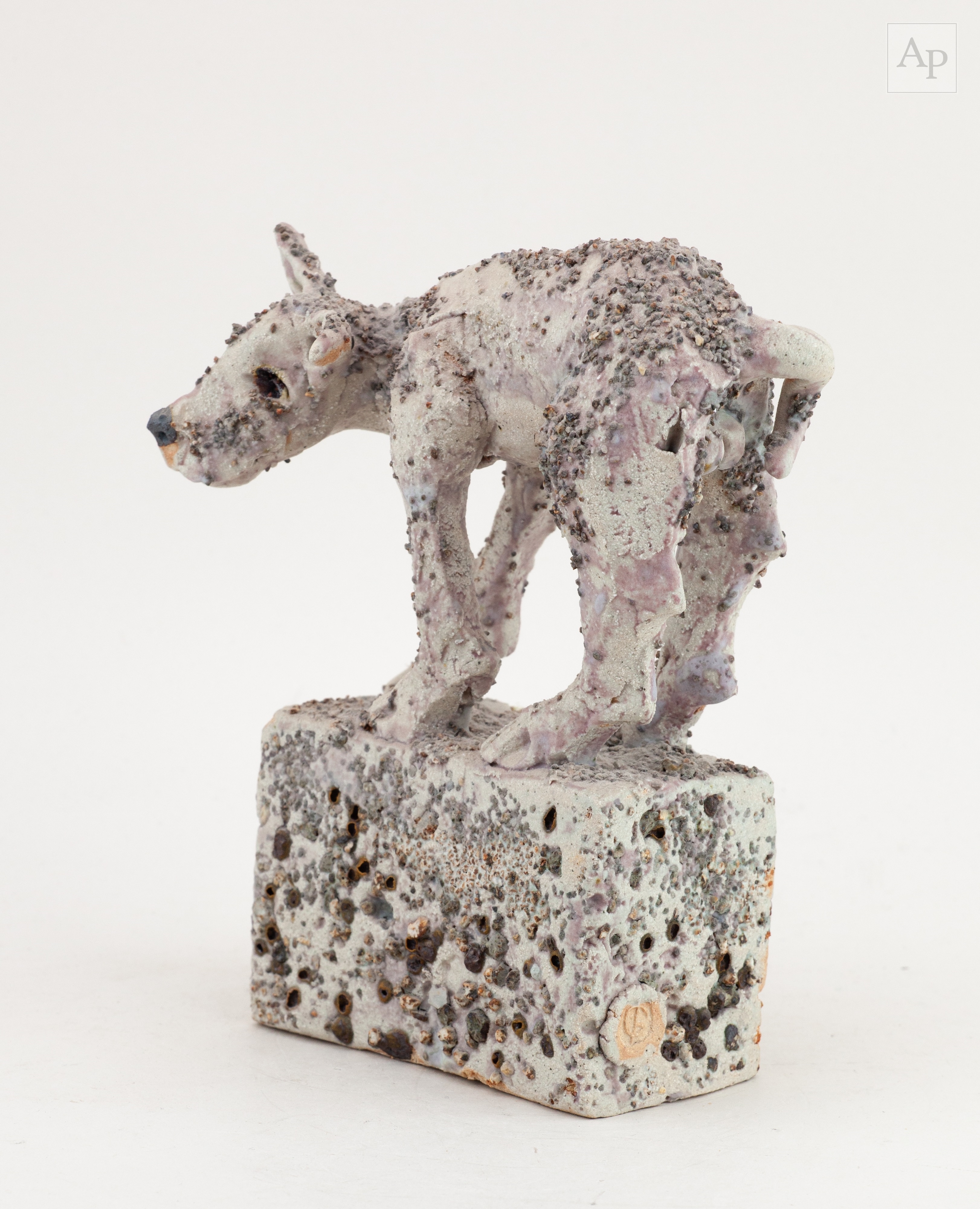 Ian Gregory | a grogged stoneware sculpture of a dog on a rectangular ...