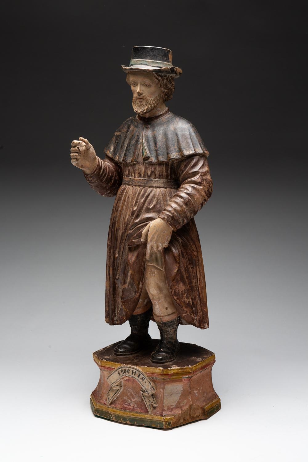 Artwork by Patron Saint, INDIAN CARVED AND POLYCHROME PAINTED WOODEN FIGURE OF SAINT ROCH, Made of CARVED AND POLYCHROME PAINTED WOOD