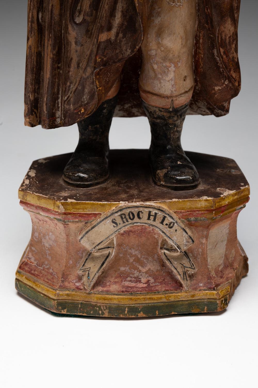 Artwork by Patron Saint, INDIAN CARVED AND POLYCHROME PAINTED WOODEN FIGURE OF SAINT ROCH, Made of CARVED AND POLYCHROME PAINTED WOOD