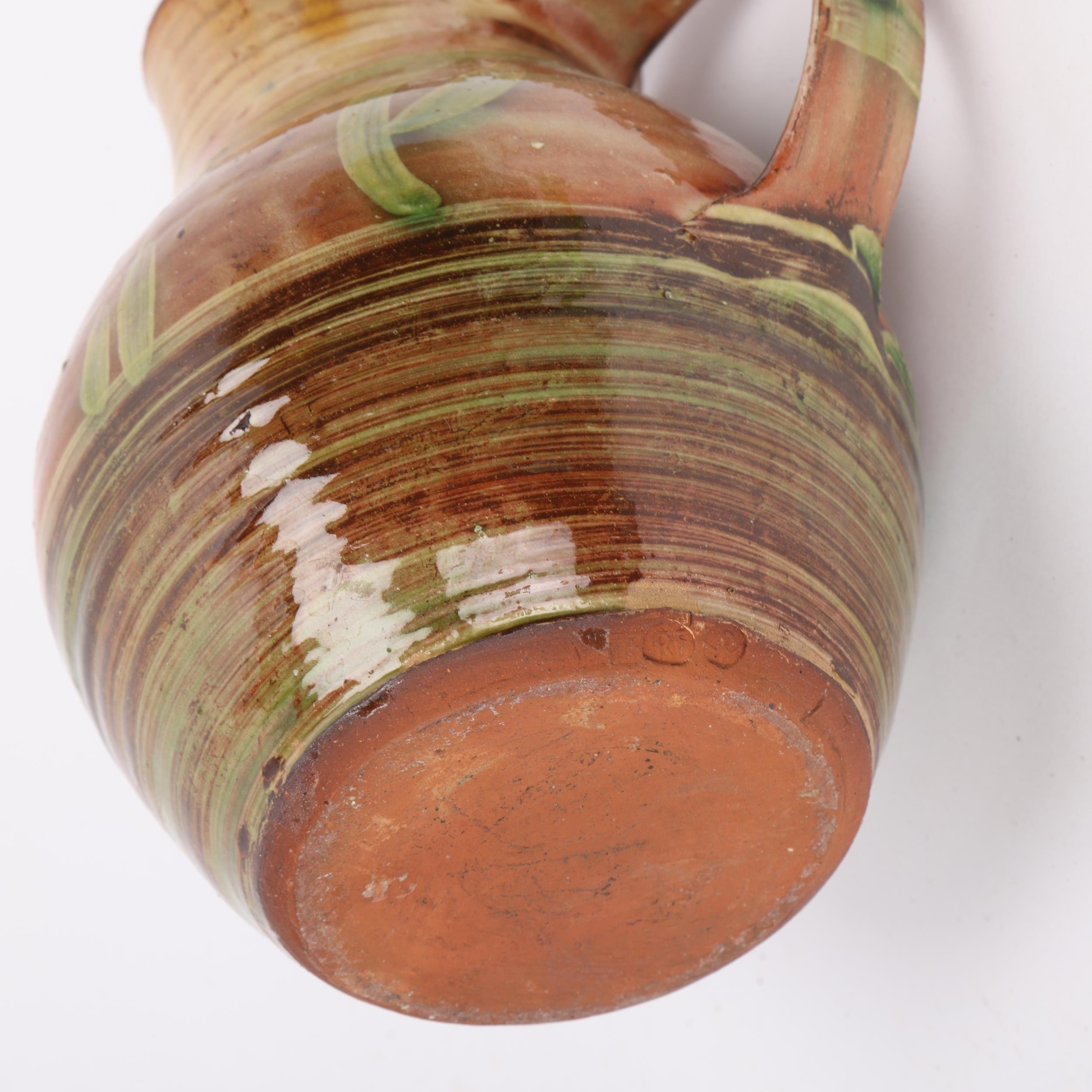 Ray Finch | an eartheware jug with slip glazes (Circa 1940) | MutualArt