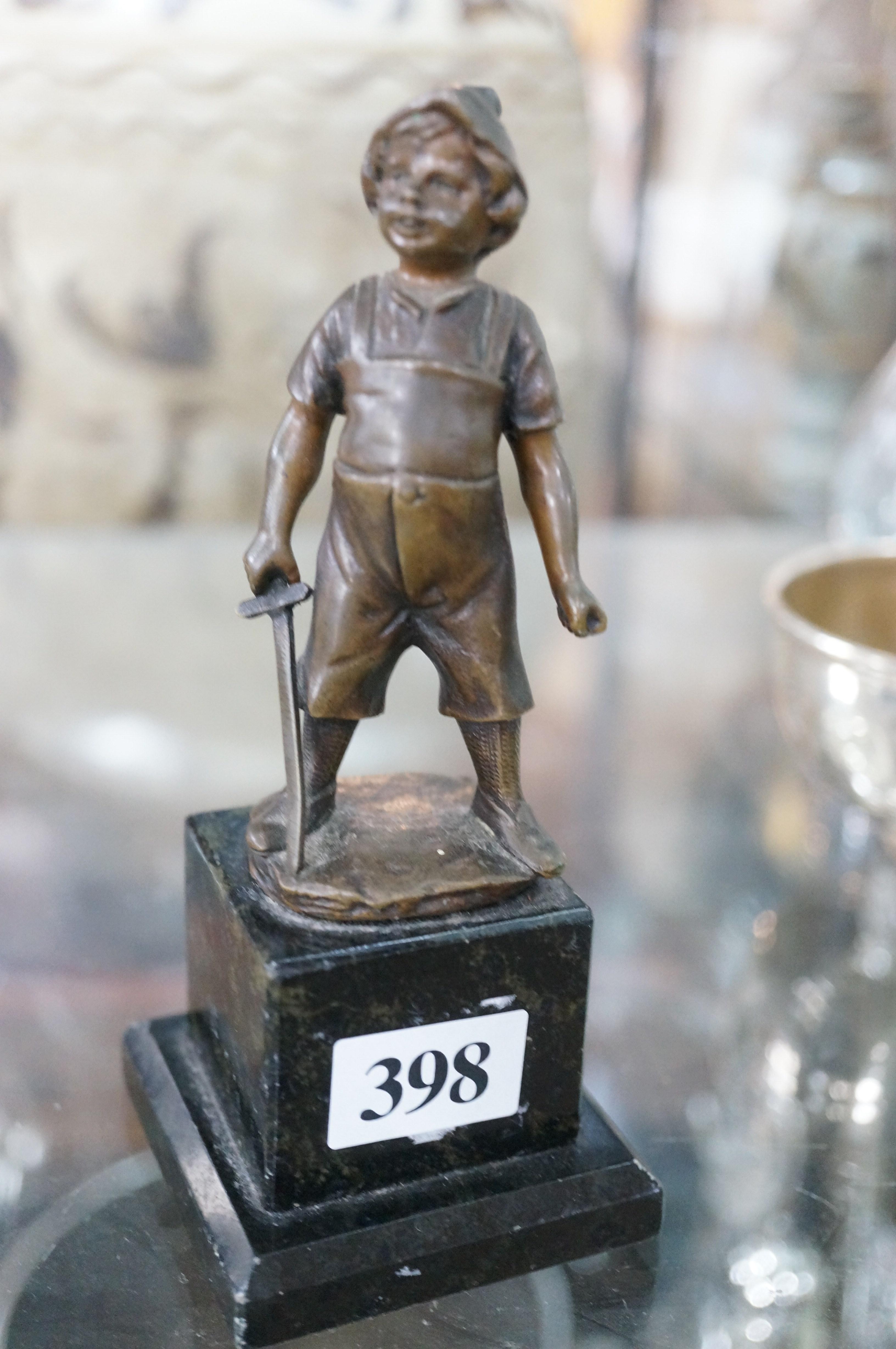 Artwork by G. Jaeger, Antique figure of boy with sword, Made of bronze on marble base