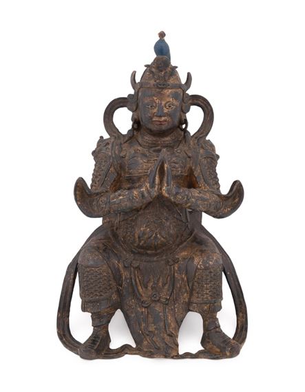 CHINESE BRONZE SEATED BUDDHIST GUARDIAN by Chinese School