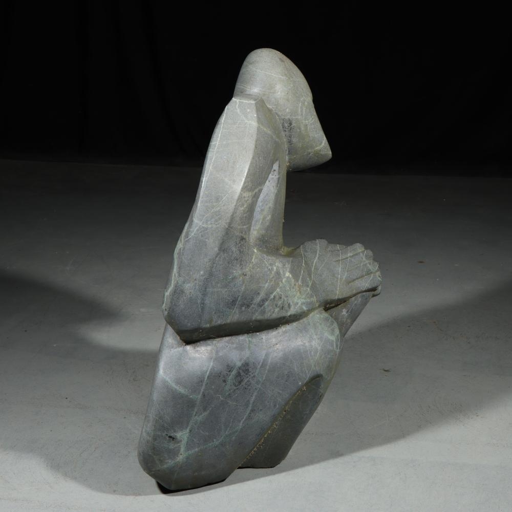 Mavis Mabwe | seated male figure | MutualArt