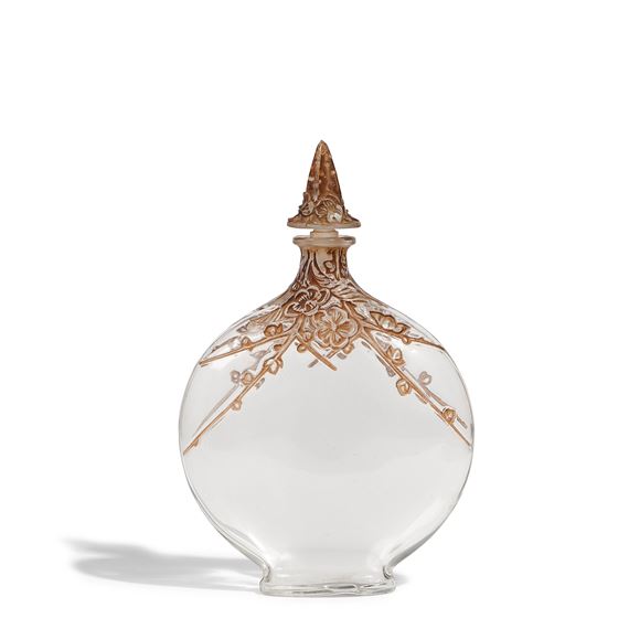 Rare Flowering Branch Scent BottleMarcilhac HC 33, designed 1930clear glass with sepia patina, acid etched 'MADE IN FRANCE' on undersideheight with stopper 6 3/4in (17.2cm); width 4 1/4in (11cm); depth 1 3/8in (3cm by René Lalique, designed 1930