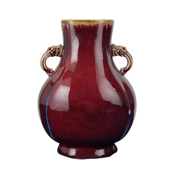 A CHINESE DOUBLE HANDLE FLAMBE GLAZED VASE by Chinese School