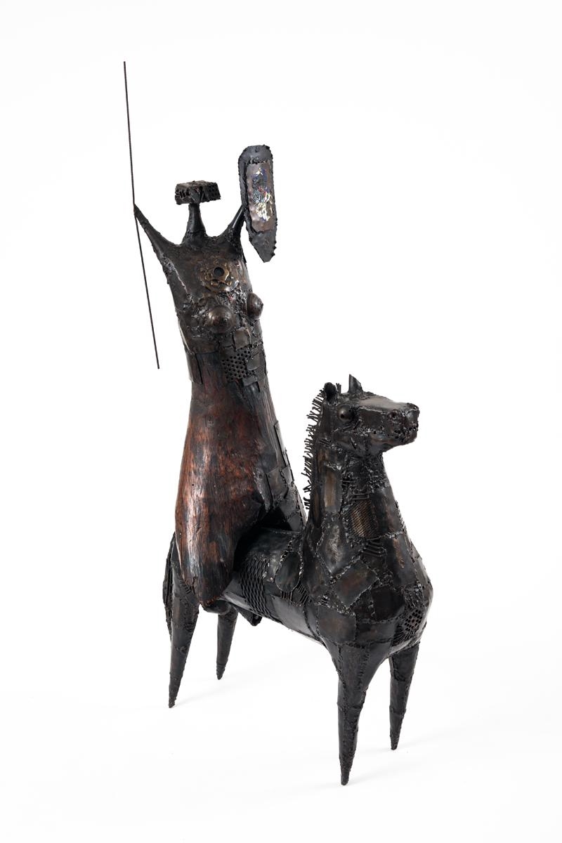 Artwork by Francisco Stockinger, Amazona com escudo, Made of wood and iron