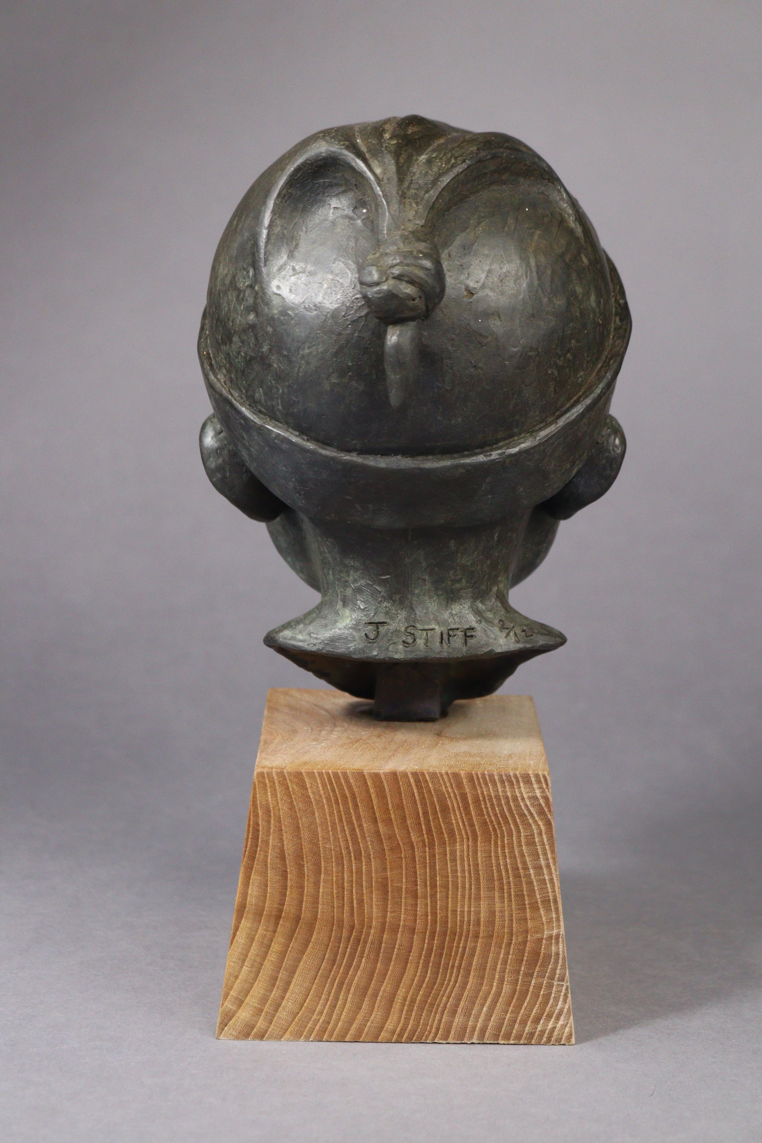 Artwork by Jeremy Stiff, A bronze sculpture of the head of a boy, Made of bronze