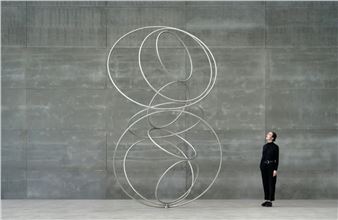 Mesmerizing Kinetic Sculpture Made of Delicately Stacked Steel Rings