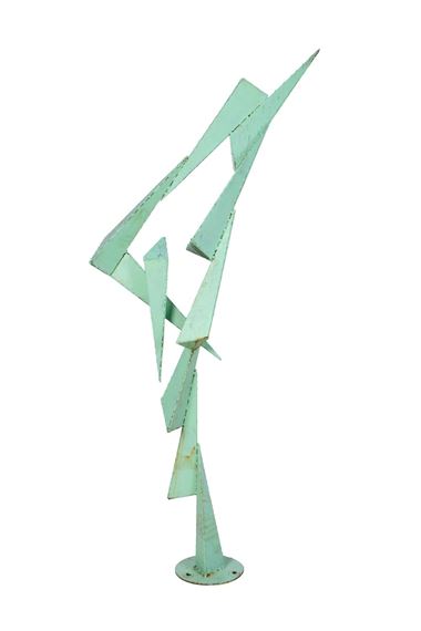 Vertical sculpture composed of light green joined triangular forms