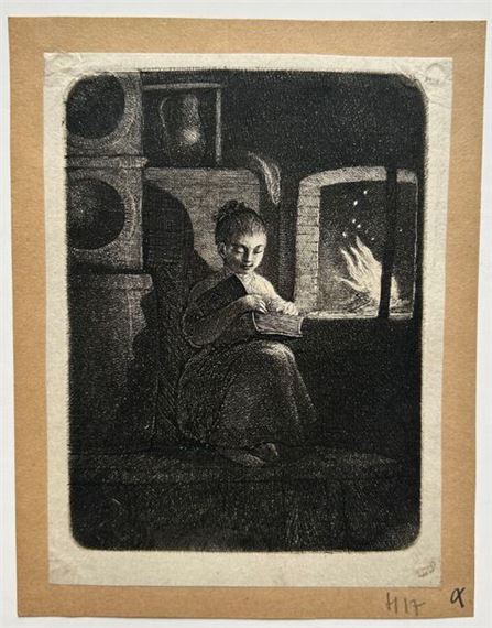 Young girl reading by the fire