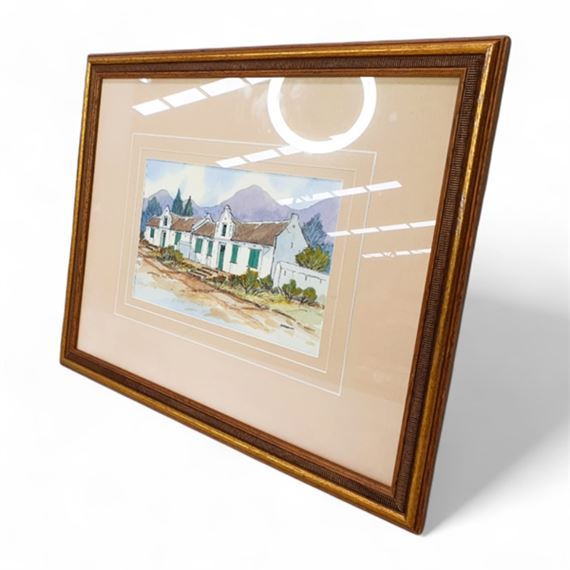 GILT FRAMED WATER COLOURED PAINTING OF A CAPE DUTCH HOUSE by Stef Madden